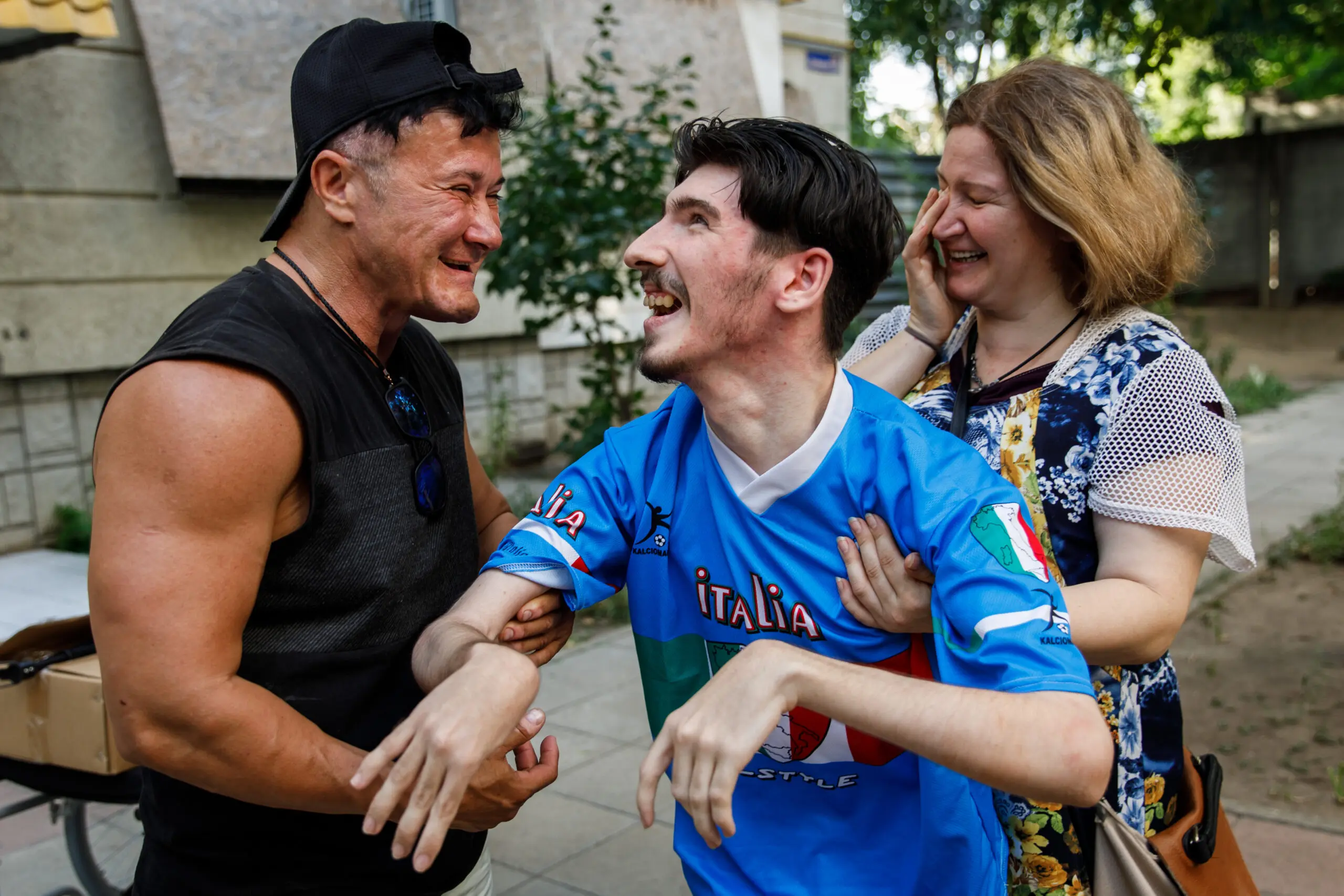 Anna Kurkurina shares a moment with Bogdan Popov, a young man with cerebral palsy who Kurkurina has helped strength train.