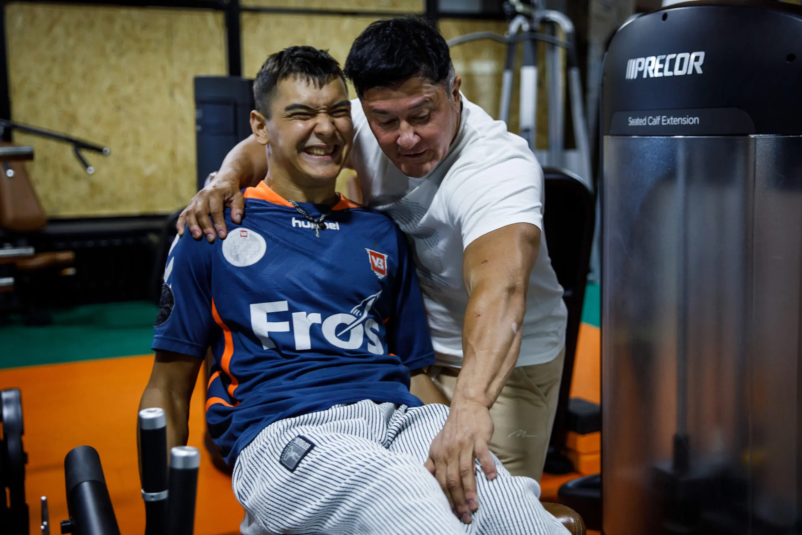 Anna Kurkurina works with Dmitry Zakrevsky, a young man with cerebral palsy, during a training and rehabilitation session on September 8, 2023 in Mykolaiv, Ukraine.